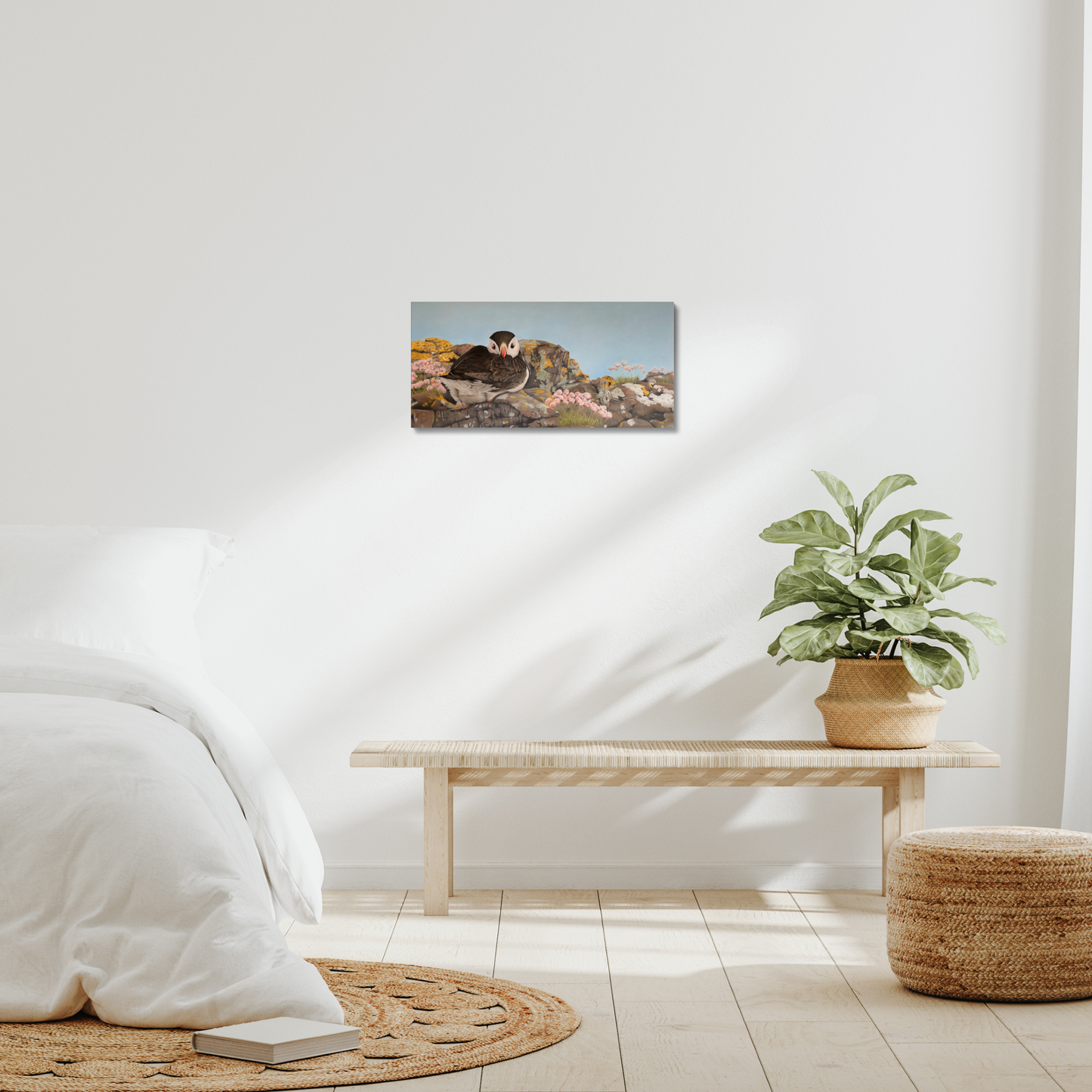 Puffin on the rocks: A stretched canvas print of a resting puffin