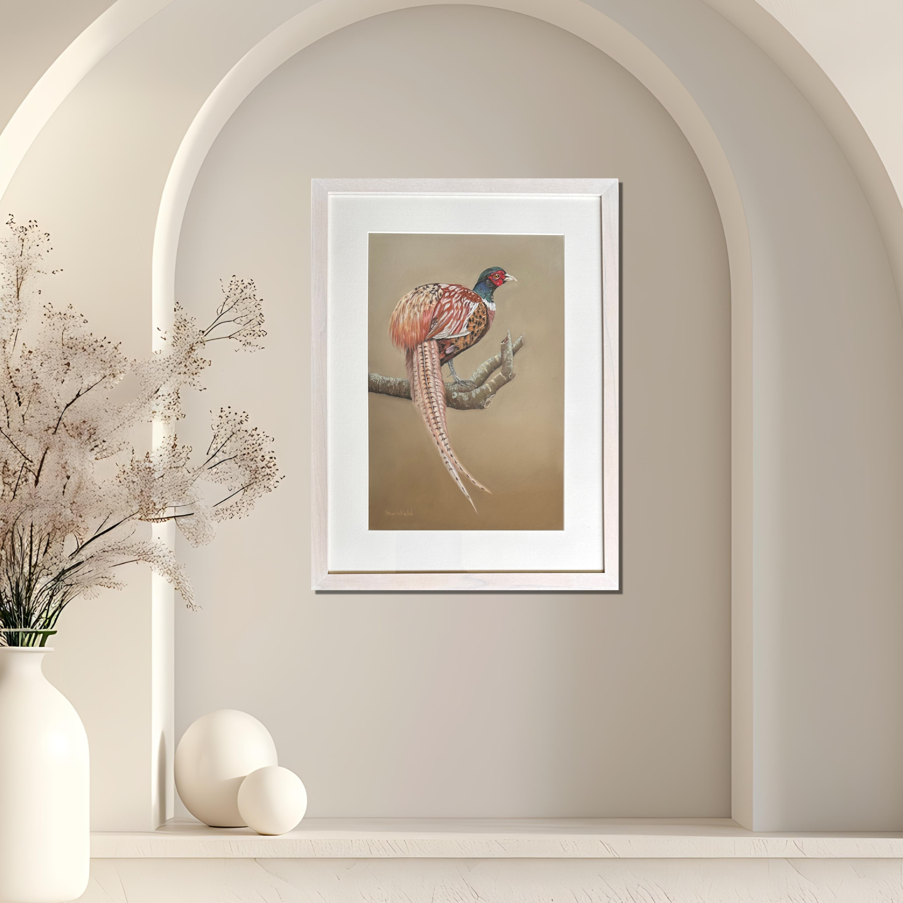 Male Phesant original pastel painting on white frame on a blank wall. Original painting by Fiona Stansfield Fine Art
